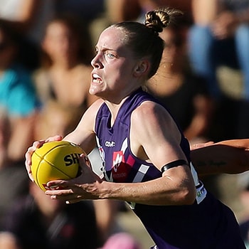 AFLW 2017 Rd 04 - Fremantle v Adelaide PERTH, AUSTRALIA - FEBRUARY 26: Stephanie Cain of the Dockers is tackled by Rhiannon Metcalfe of the Crows during the 2017 AFLW Round 04 match between the Fremantle Dockers and the Adelaide Crows at Fremantle Oval on February 26, 2017 in Perth, Australia. (Photo by Will Russell/AFL Media)